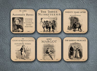 6 coasters with Alexandre Dumas novels. The Three Musketeers, Twenty Years After,The Count of Monte Cristo,Queen Margot,The Queen's Necklace